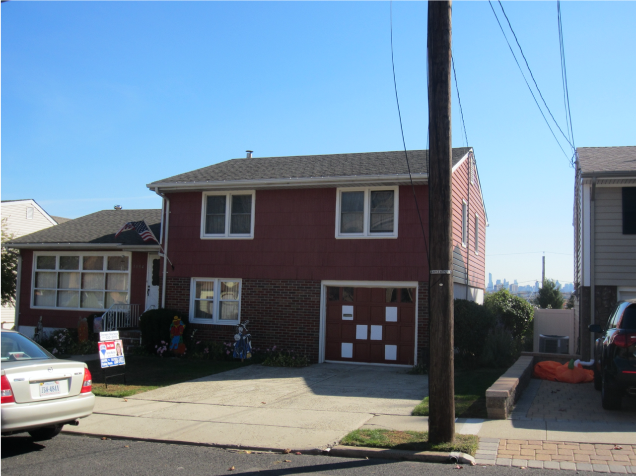 BEFORE: Front of original house with split levels