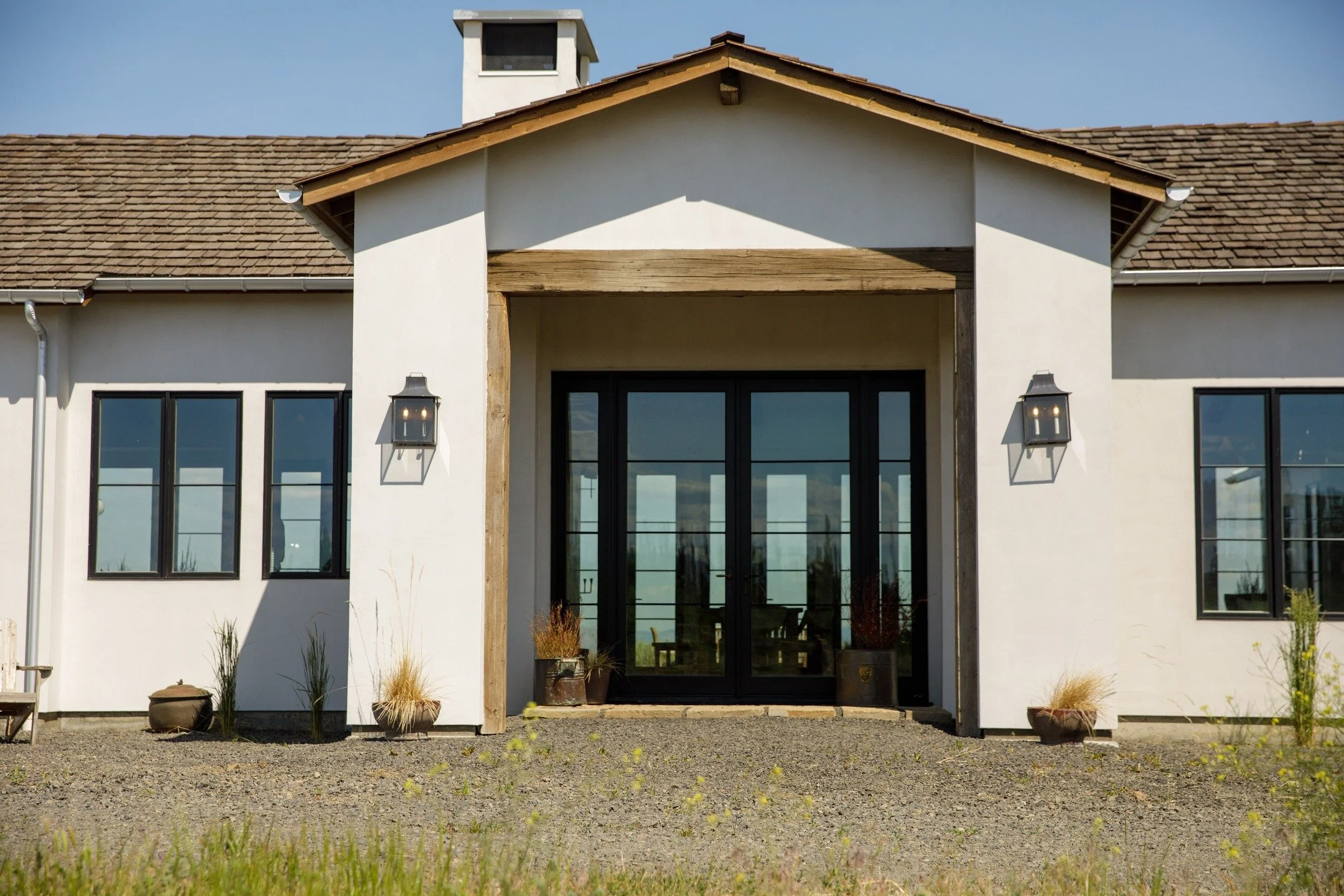 Stepping foot inside this home transports you to anywhere you want in the world. And the fact that it's nestled on a bluff overlooking one of the most stellar views in Central Washington makes it even better. When we needed a location for some video 