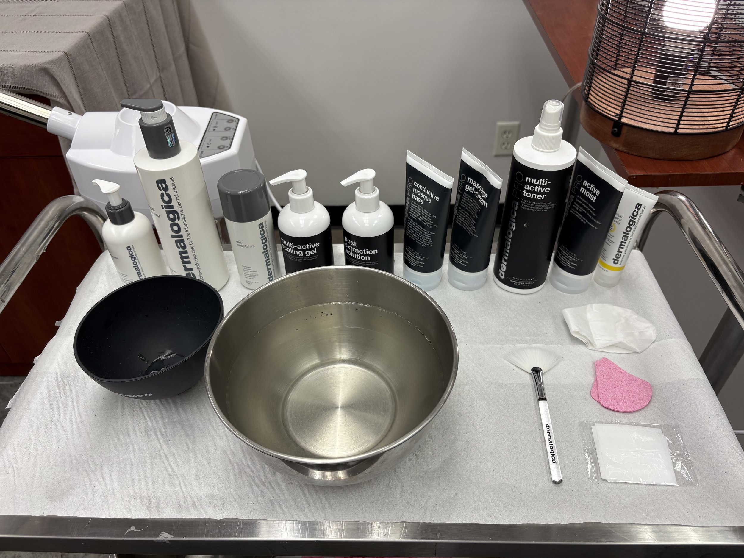 A look at my student esthetician cart, prepped with essential skincare tools and products.