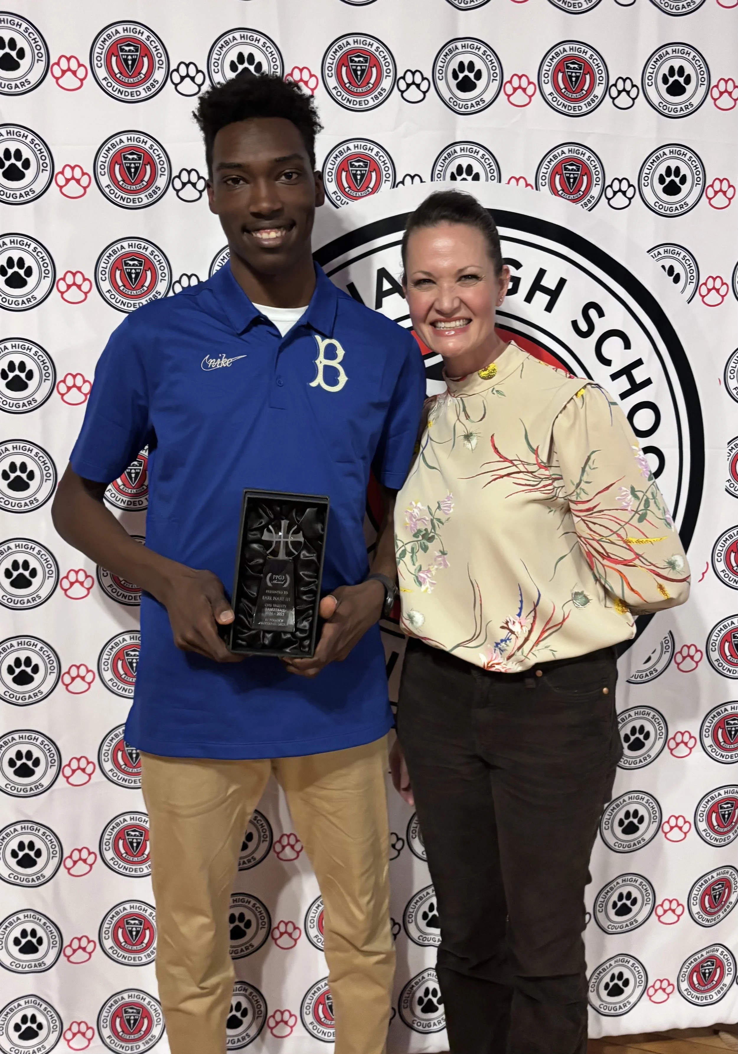 Vanessa with Earl Hart Jr III winner of the PPG3 award for the most 3-pointers this season