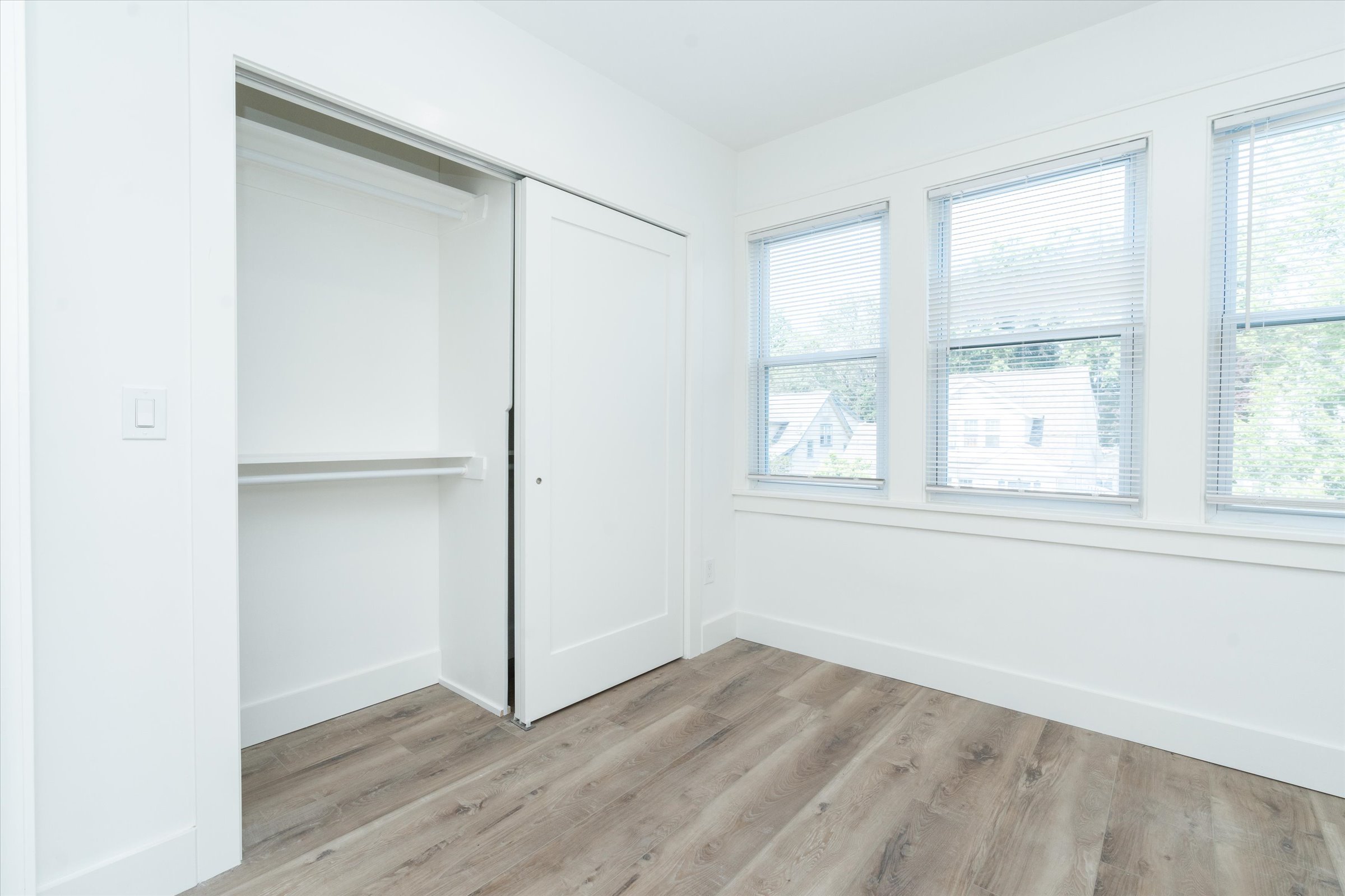 14-14 - Bed #1 with closet open.jpg