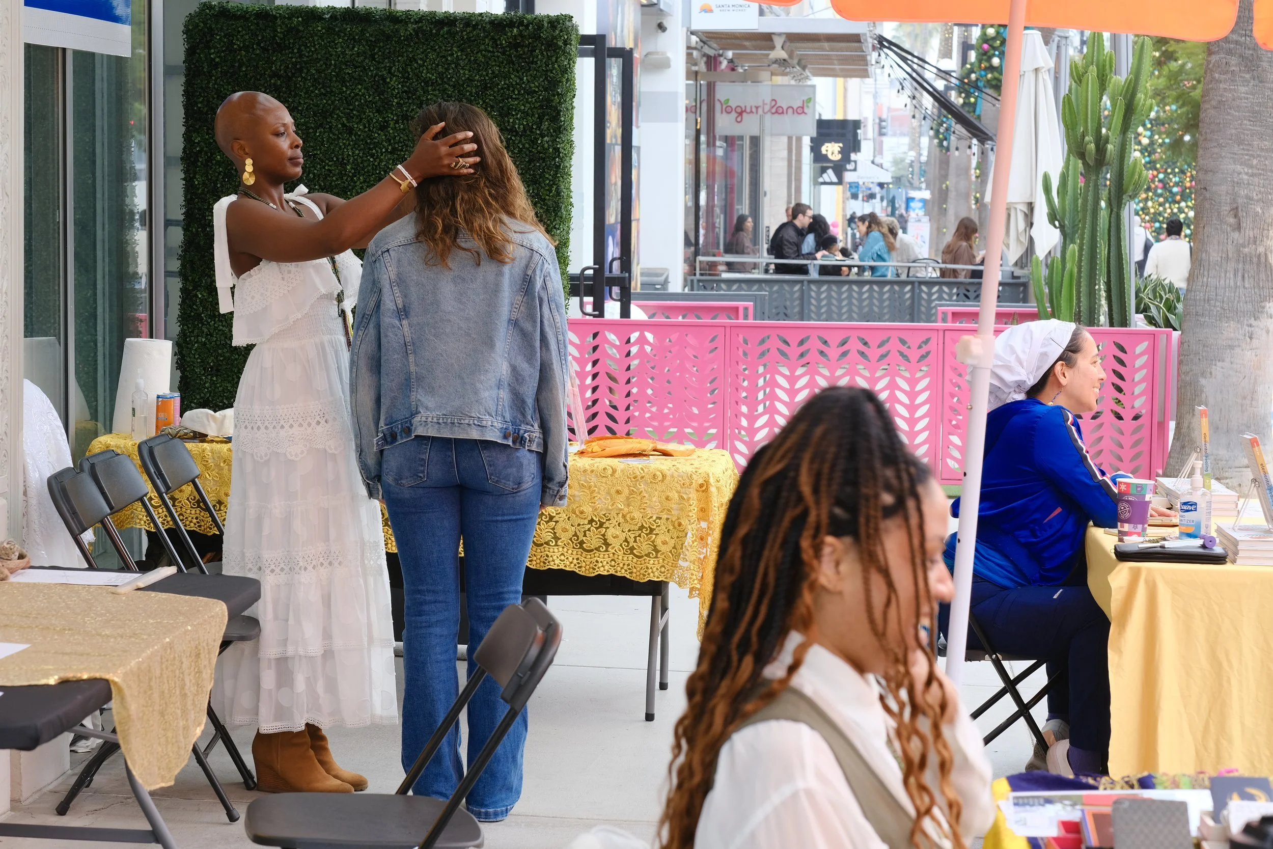 ONYI LOVE providing PureBioenergy Healing at Care Cafe presented by Sanyu Estelle for the city of Santa Monica's 150th Anniversary (2025). Photos by Reva Santo.