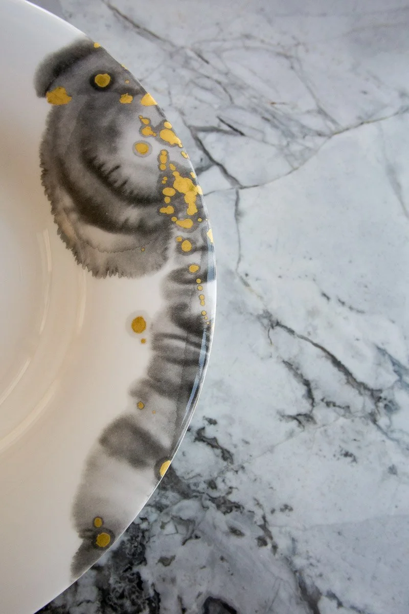  Dishes and marble countertop in NYC 
