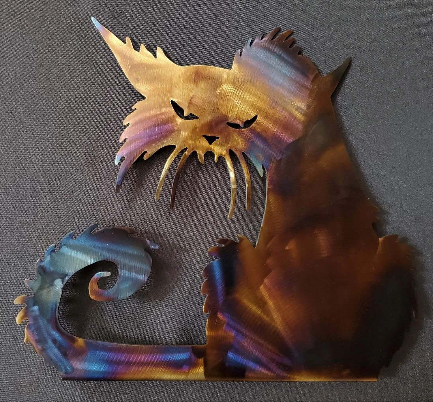 Metal steel cat decoration with color from heat treating by METALgarden