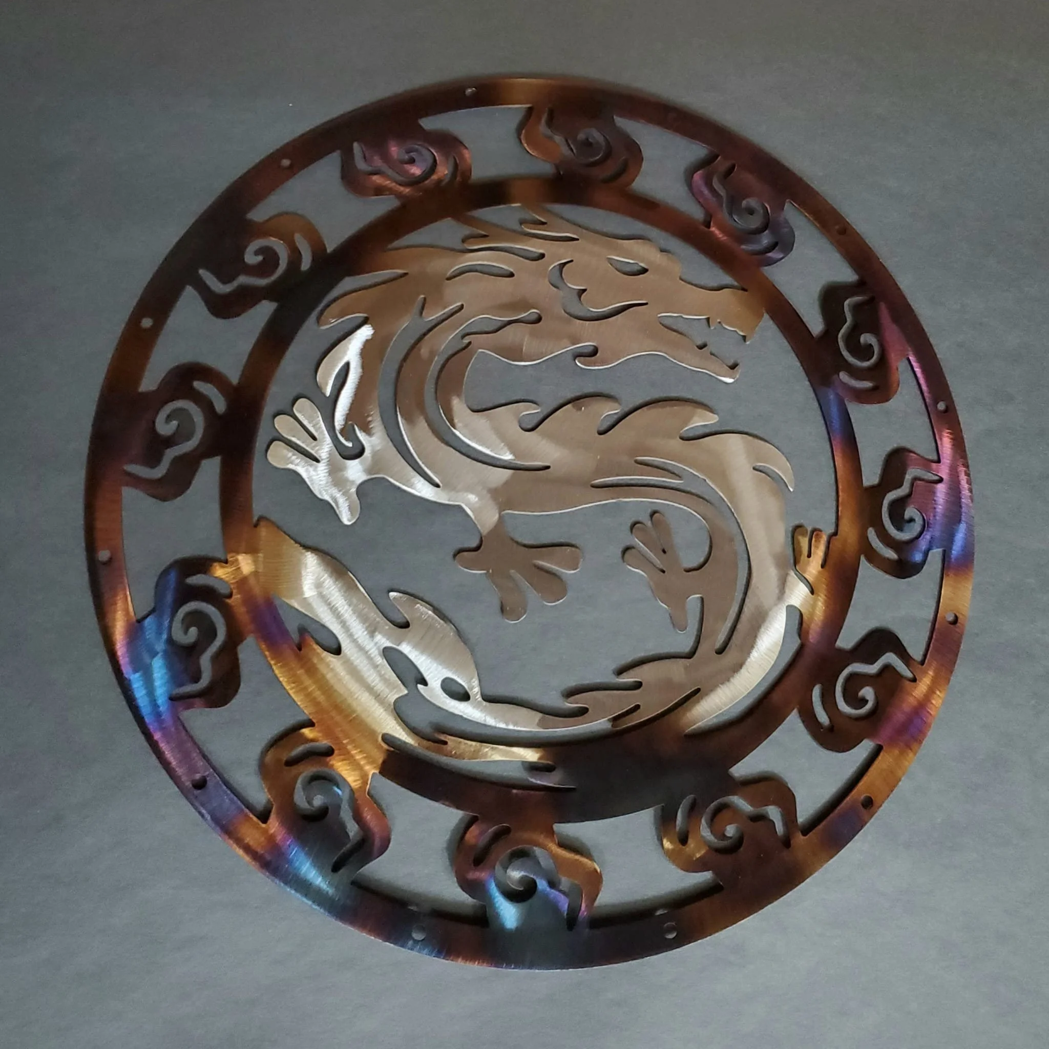 Metal steel dragon in circle wall decoration with color from heat treating by METALgarden