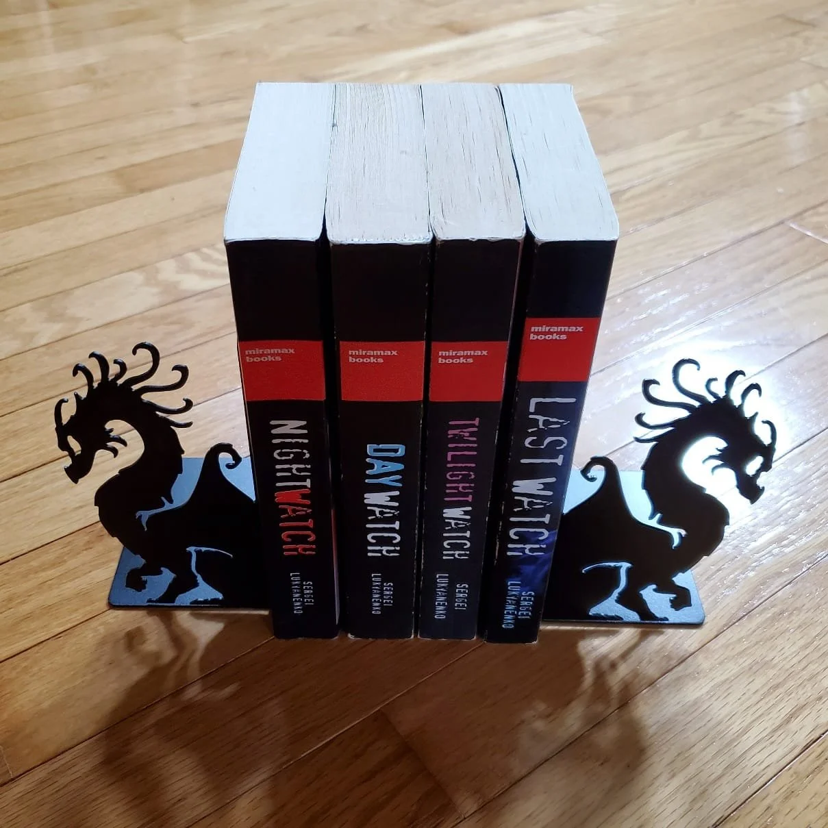 Metal dragon book ends painted black by METALgarden