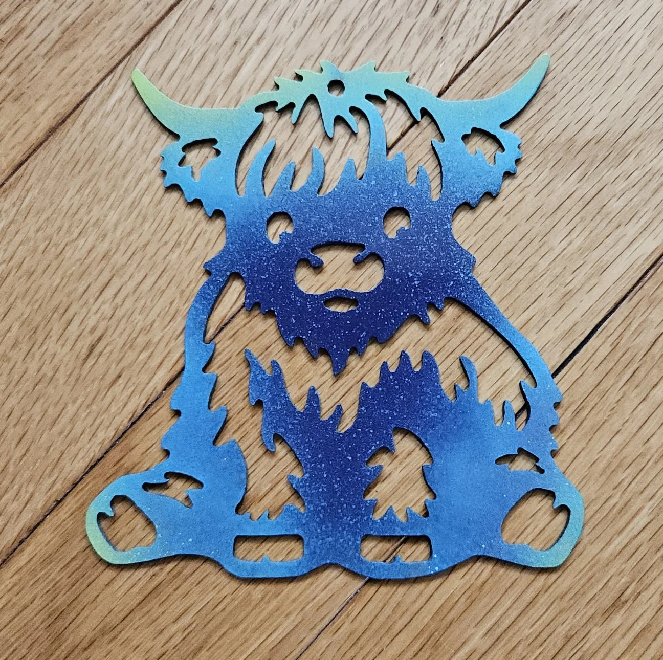 METALgarden-Cow-Blue-Paint-Ornament-Wall-Decoration.jpg