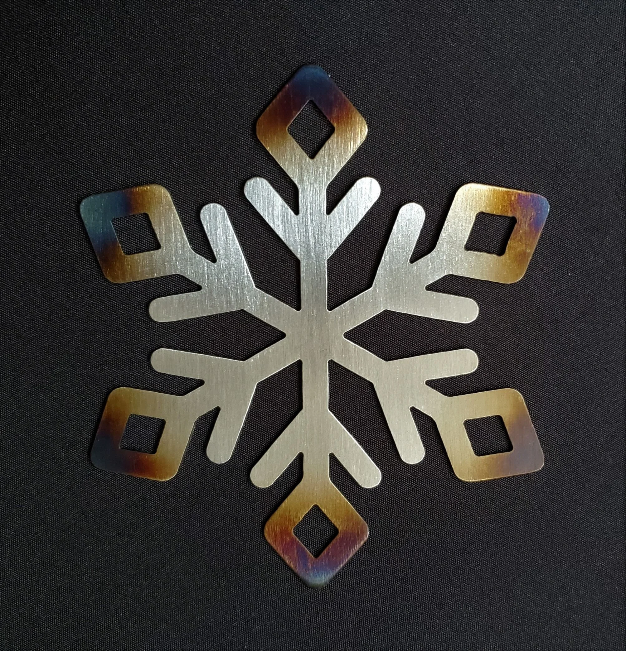 Metal steel snowflake with diamond tip design ornament or decoration with color from heat treating by METALgarden