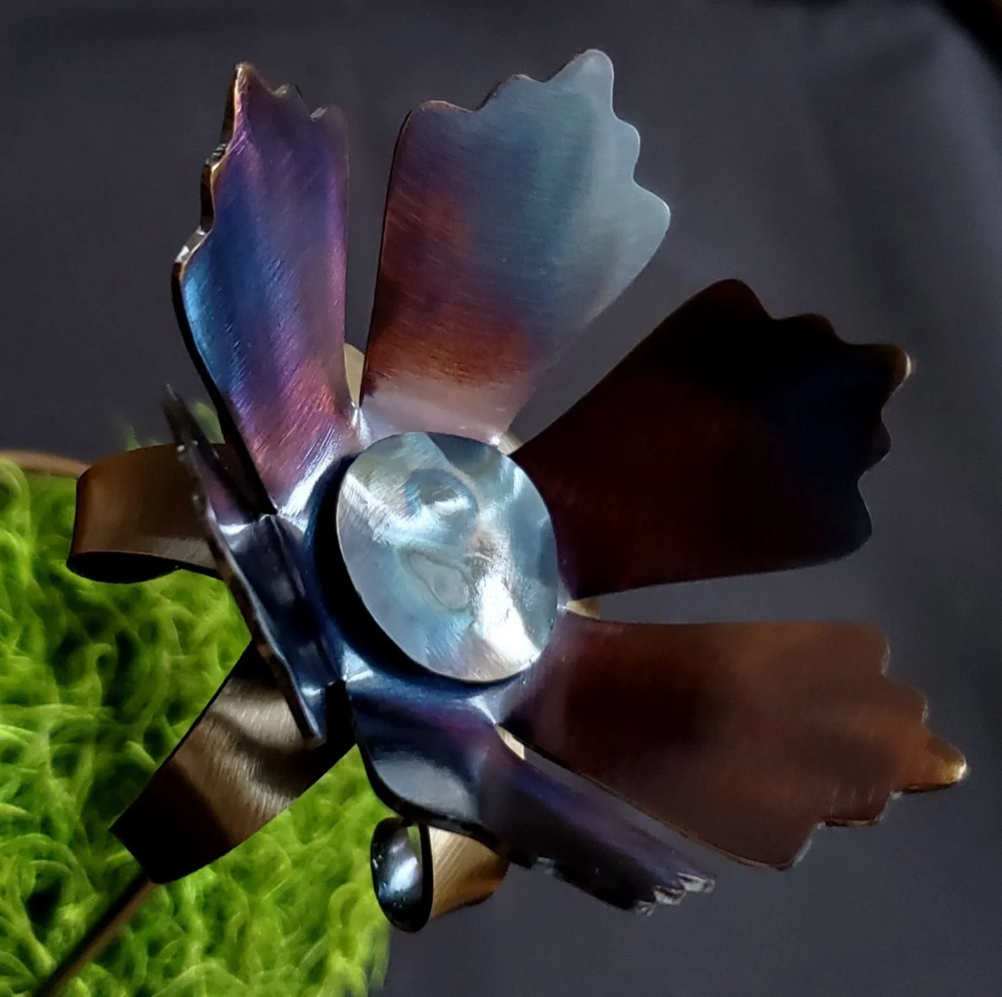 Metal steel three-dimensional flower decoration with color from heat treating by METALgarden for the garden or a flowerpot