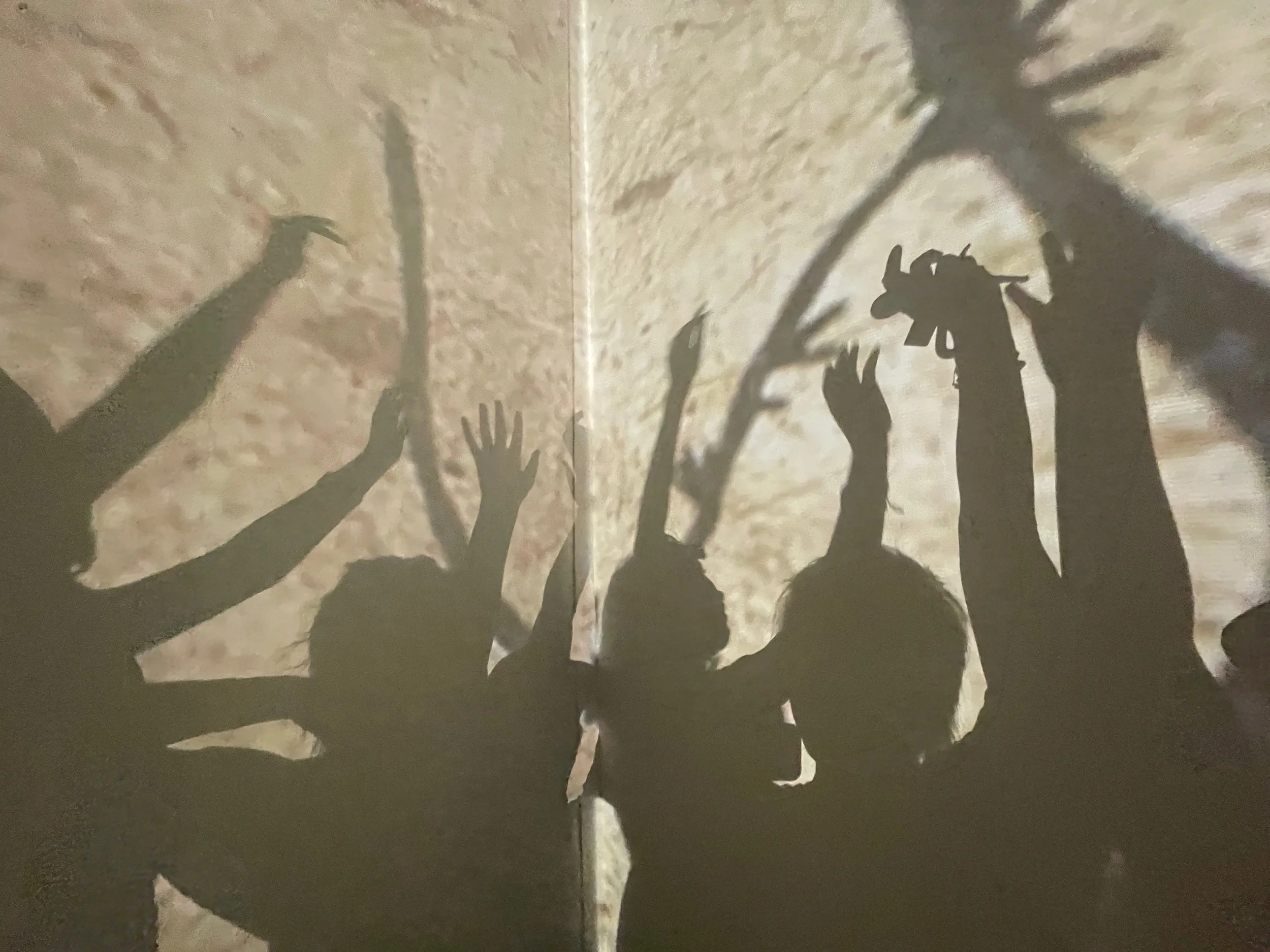 hands reaching in wonder and delight.jpeg