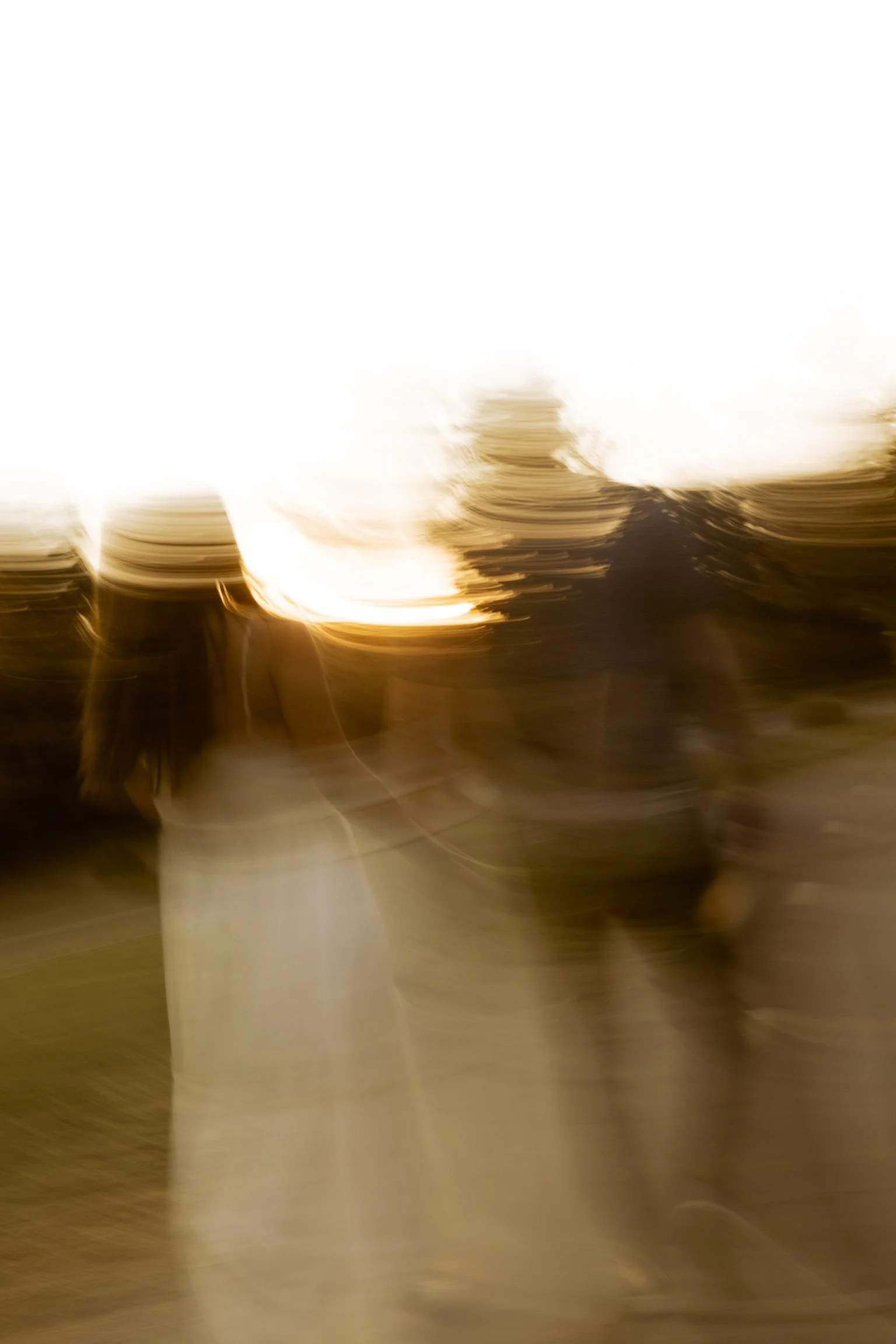 golden California sunset with a couple walking home after dinner
