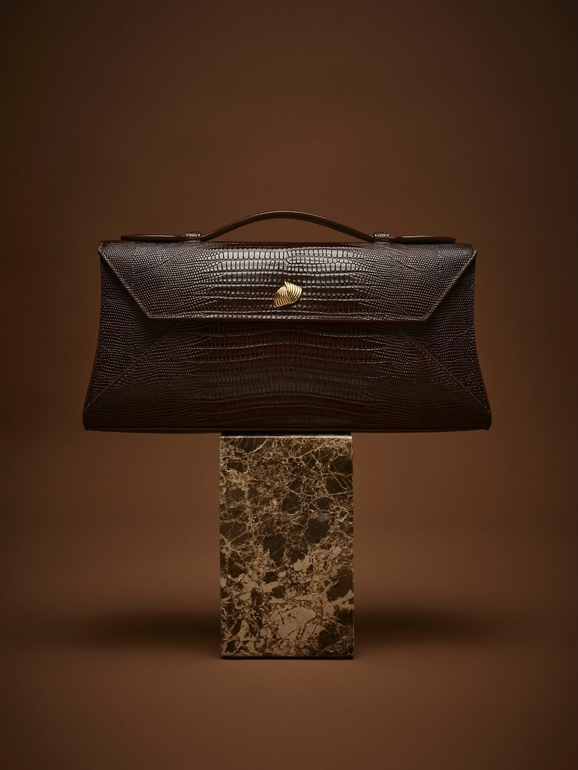Introducing the Cassandra Clutch Lizard Collection.  Discover 4 new color ways in the texture of.jpg