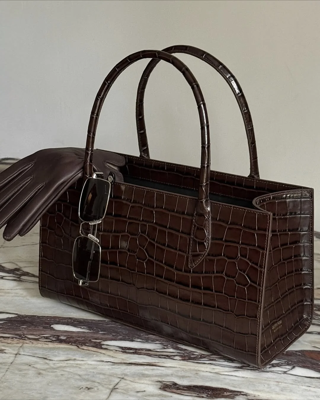 Your guide to styling chocolate brown this fall. Discover accessories handcrafted in Italy..jpg