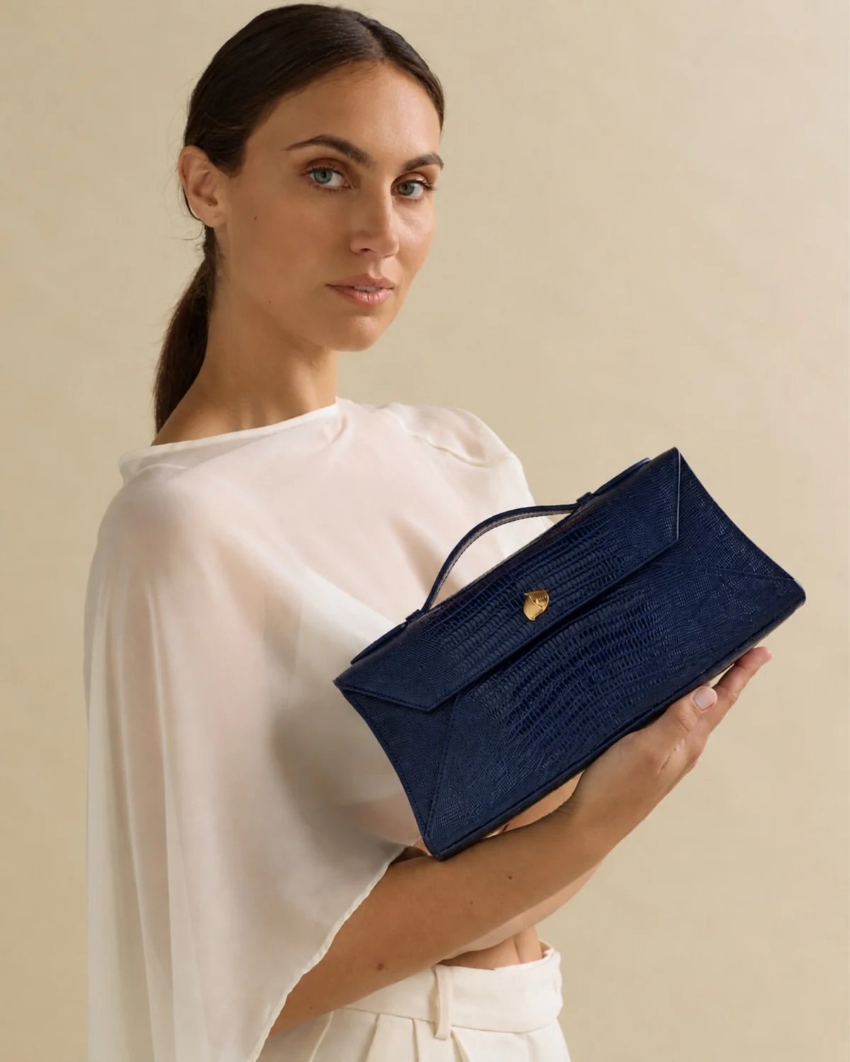 Discover the Cassandra Clutch Lizard Collection.  Now available in the 4 shades of Fall styling.-3.jpg
