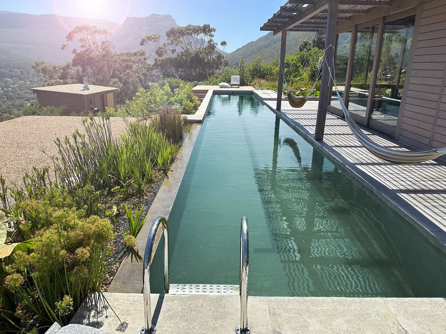 A fresh start for a stunning spot. This lap pool in Hout Bay had seen better days when our client bought the house&mdash;but the setting was too good to ignore.

We gave it a complete revamp, turning it into a clean-lined natural pool that fits right