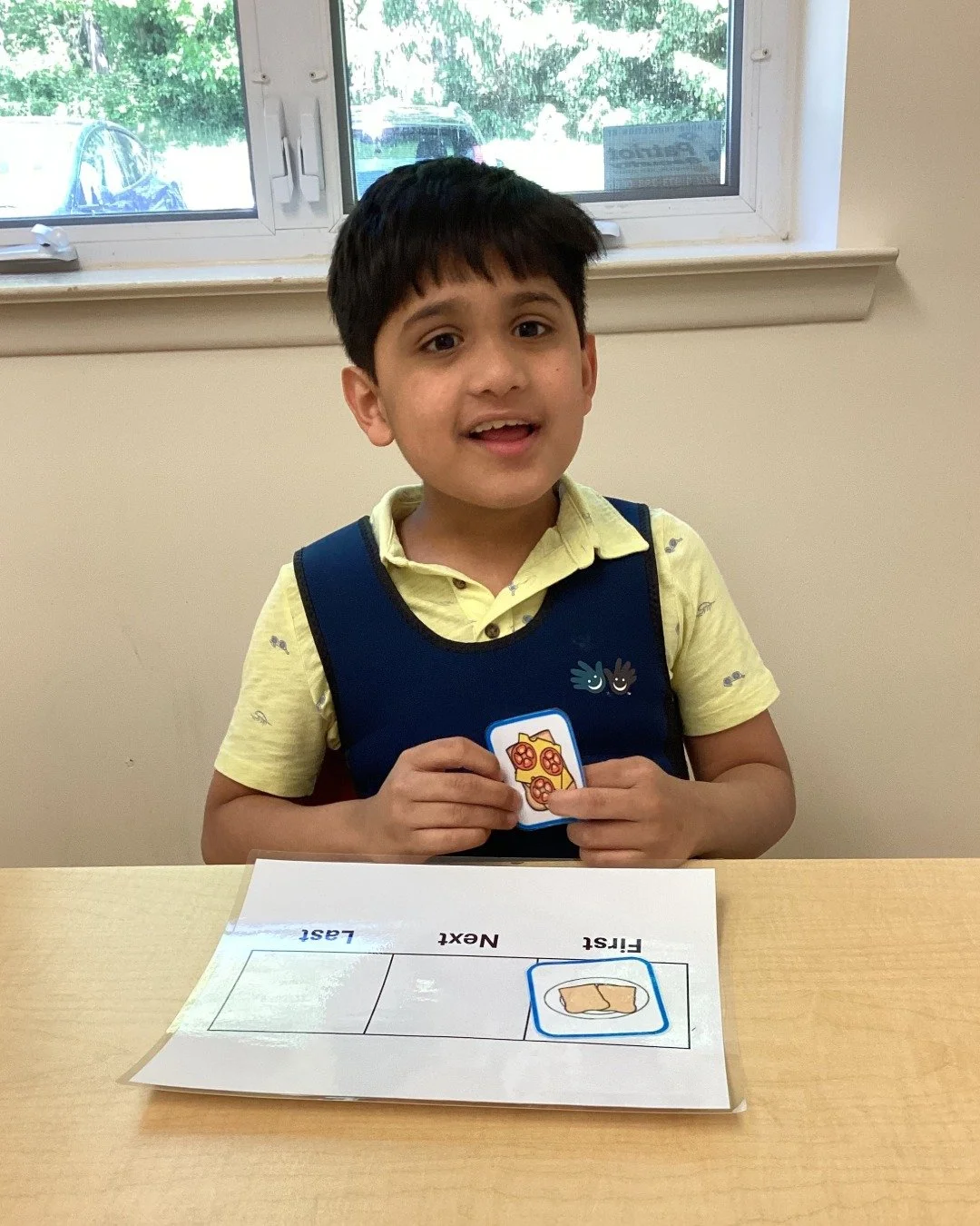 This moment is all about building understanding and communication! By working through a &ldquo;First, Next, Last&rdquo; activity, this learner is strengthening sequencing skills and expressing ideas in a structured, supportive setting designed to mak