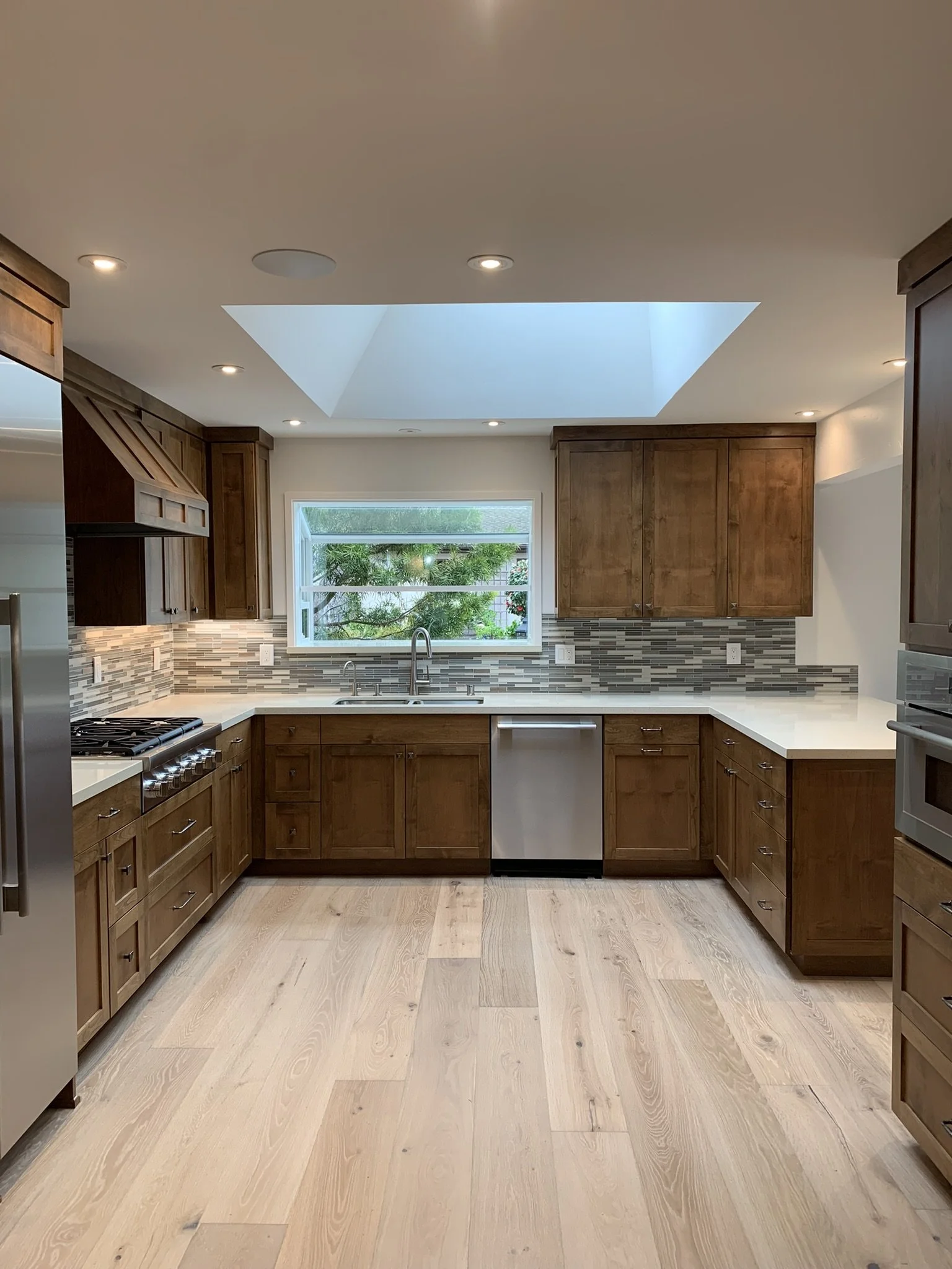 Warm Transitional Kitchen Kitchen Remodel by De Mattei Construction Inc. project photo