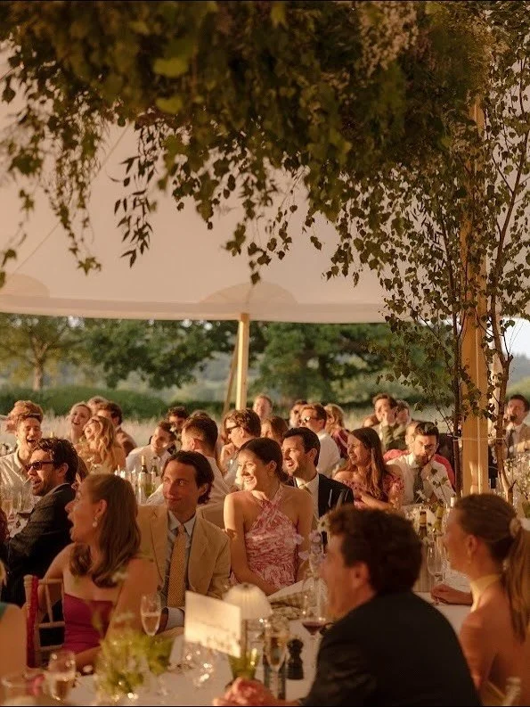 Surrounded by lush summer greenery within and beyond the marquee for S &amp; E&rsquo;s wedding reception back in June, held at their family home in the incredible Sussex countryside. The most beautiful setting and guider of the floral designs that ba