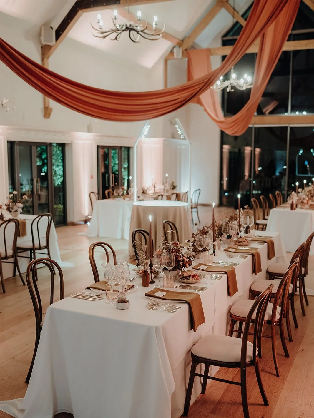 Mocha, moody and earthy tones, tall candles, velvet bows, elevated glass and table ware, antique vessels, dried botanics and delicate fresh florals, relaxed yet refined sculptural forms, fancy stationery, draping drama and a HUGE pavlova.. all sorts 