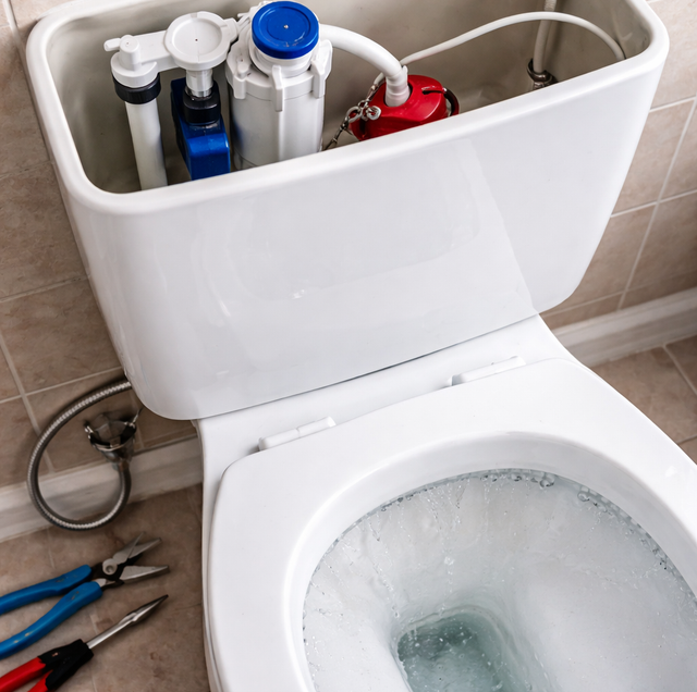 white toilet bowl with low swirling water level