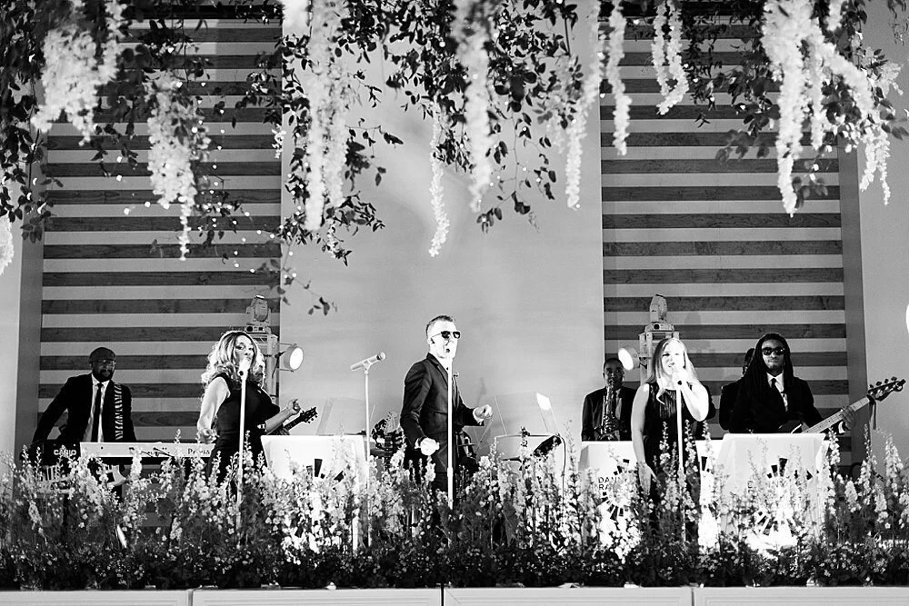  Band at The Revaire.  Loving the florals with our white setup!  Photo by A Cotton Collective 