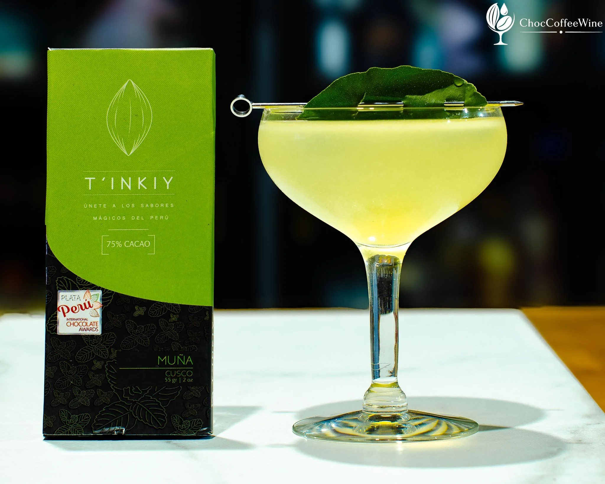 Muña Magic cocktail made with mezcal, silver tequila, sweet lime and muña liqueur in a coupe glass