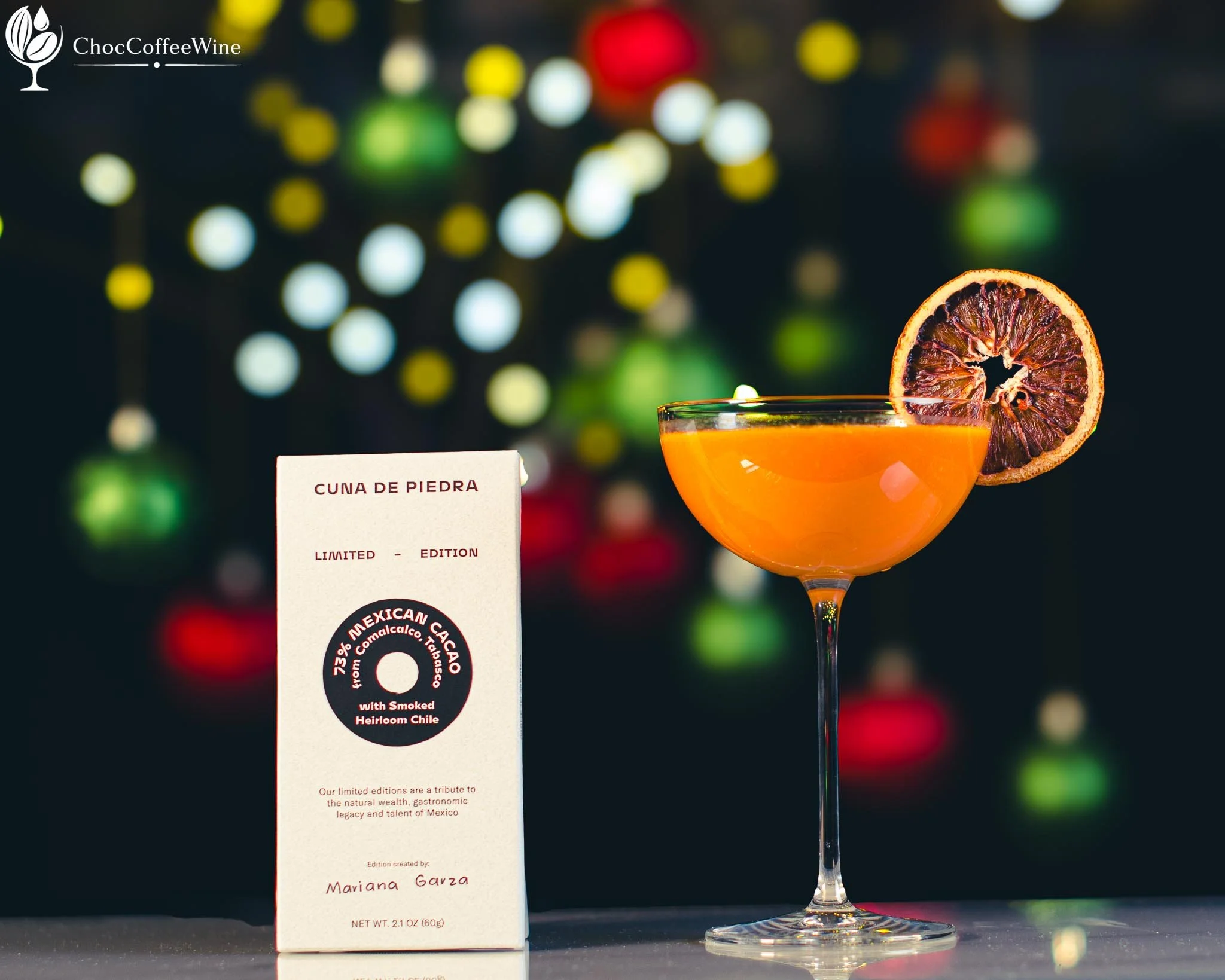 Saffron Sunrise mezcal and reposado tequila sour with egg-white foam and a fried blood-orange garnish