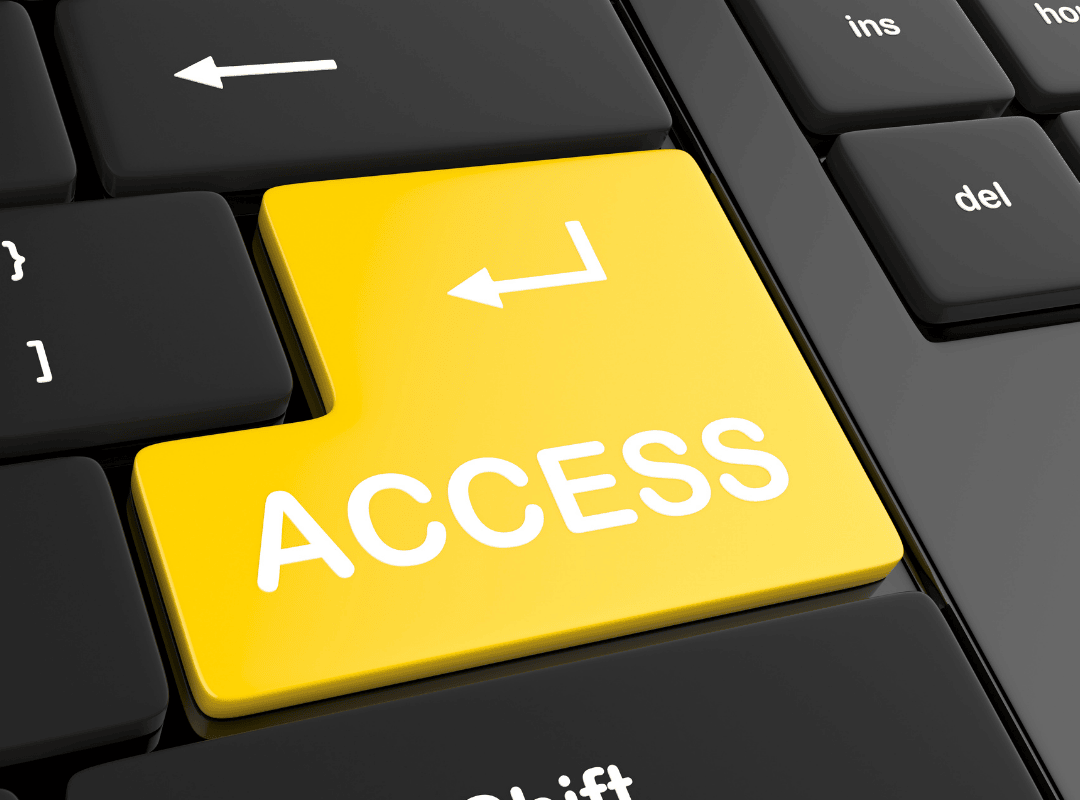 image of a computer keyboard zoomed in on the "enter" key except it says ACCESS and is bright yellow