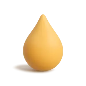 A yellow, teardrop-shaped soap or object on a white circular base against a black background.