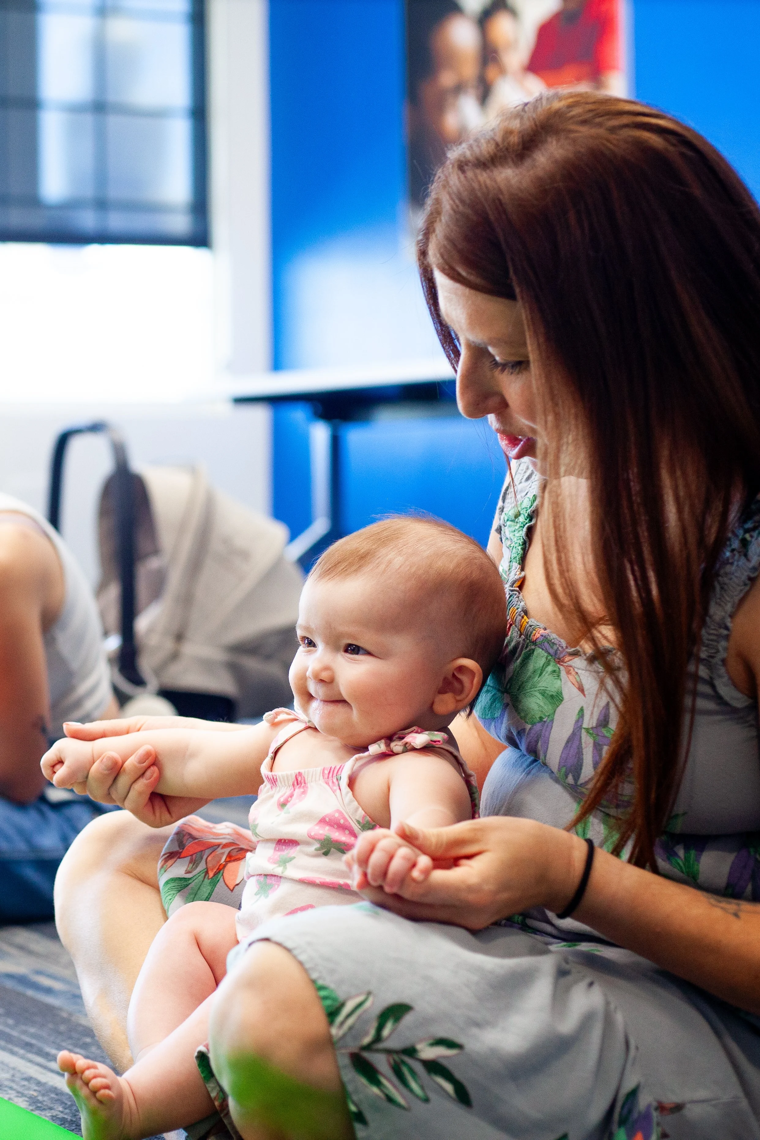 Photo of mom and baby participating in NMTS "Take A Beat" Program
