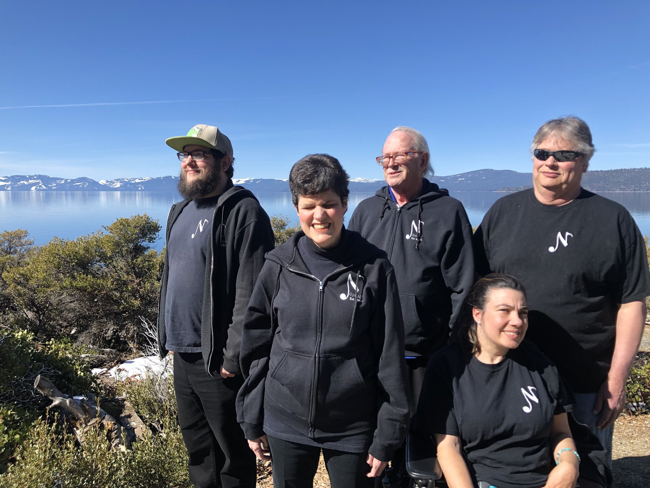 The Note-Ables posing in front of Lake Tahoe.