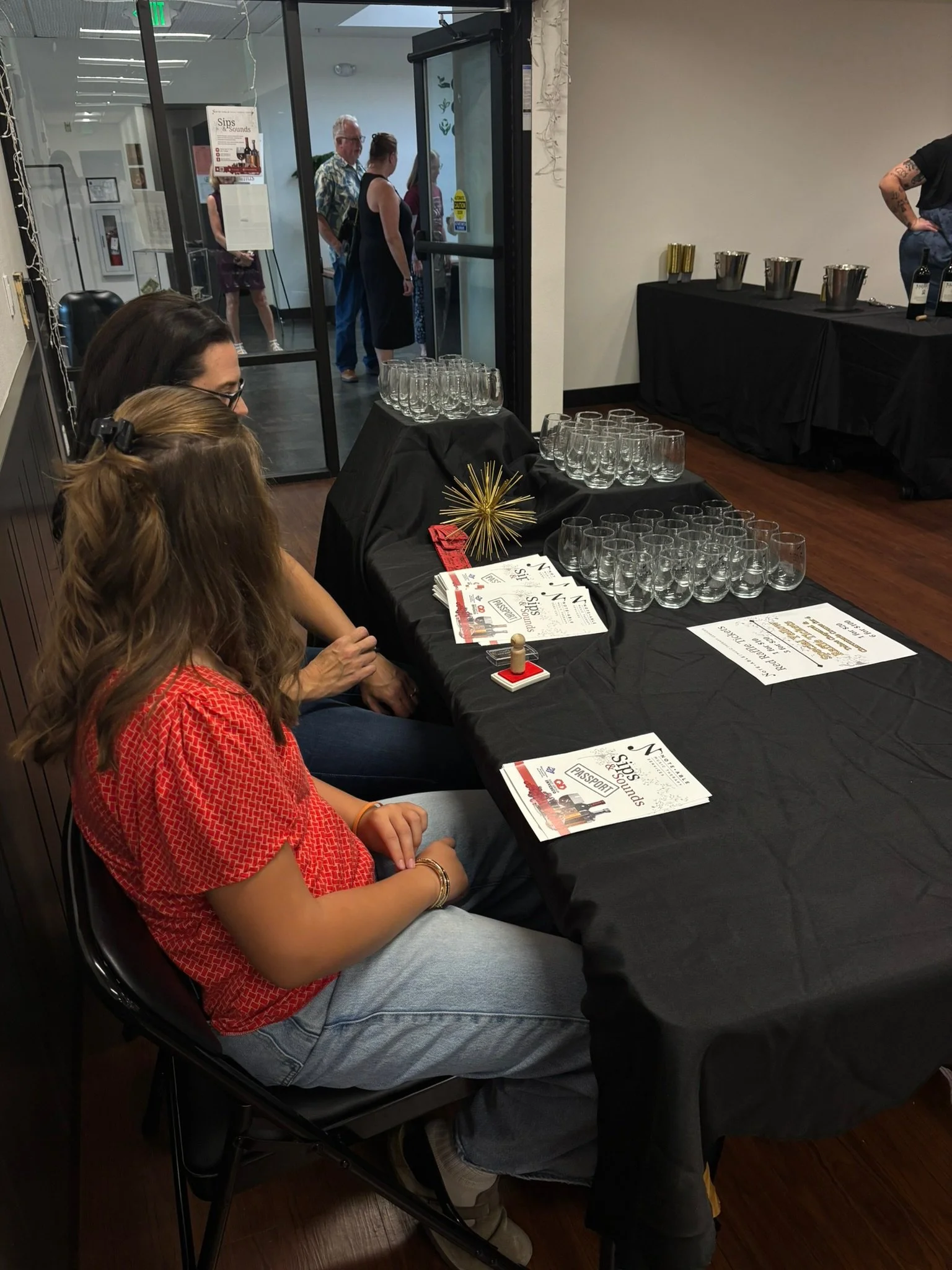 Sips & Sounds Passport Table