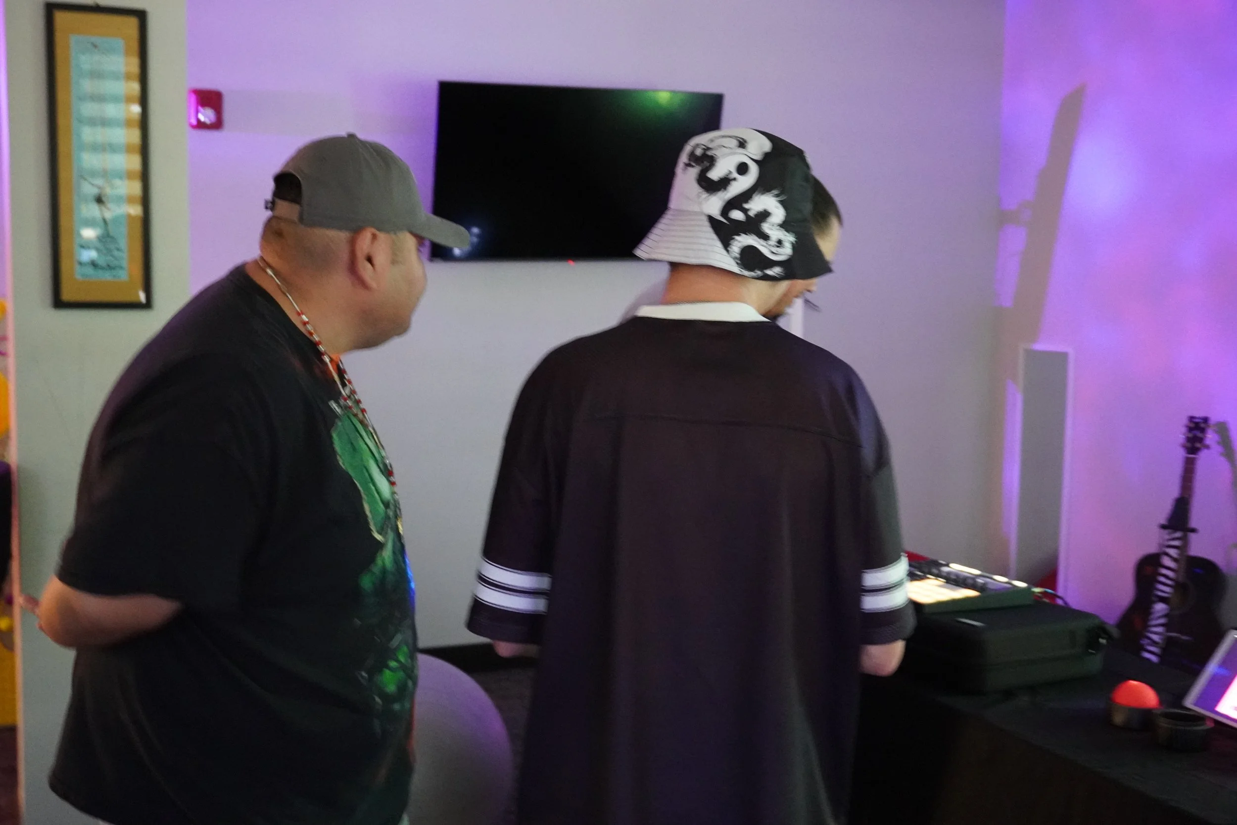 Guests exploring the electronic music room