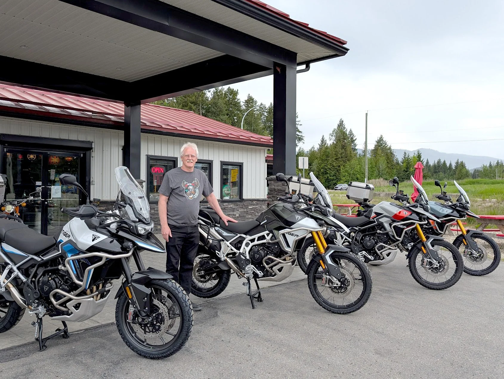 Dreamcycle Motorcycle Museum owner Mark Lane with adventure bikes