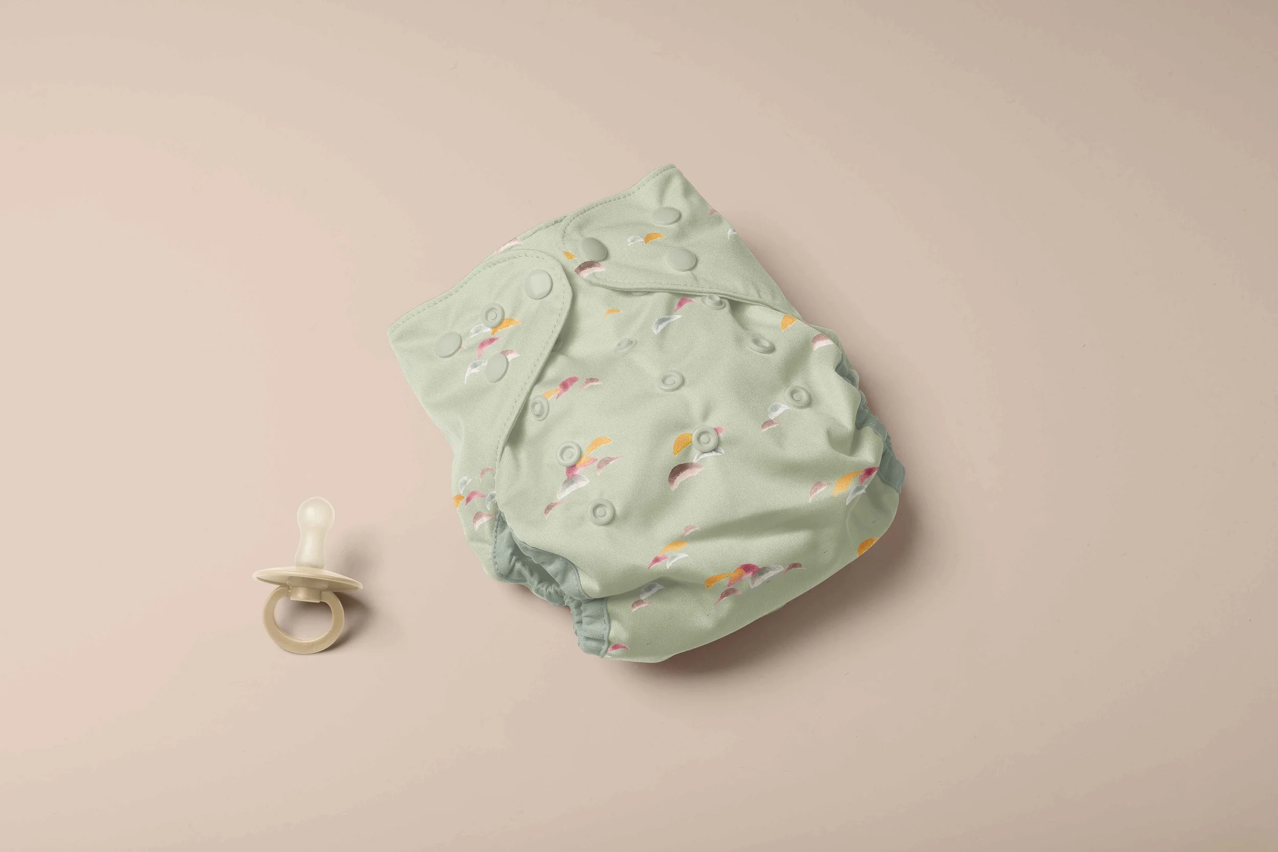 colourful waves reusable nappy diaper mock.jpg