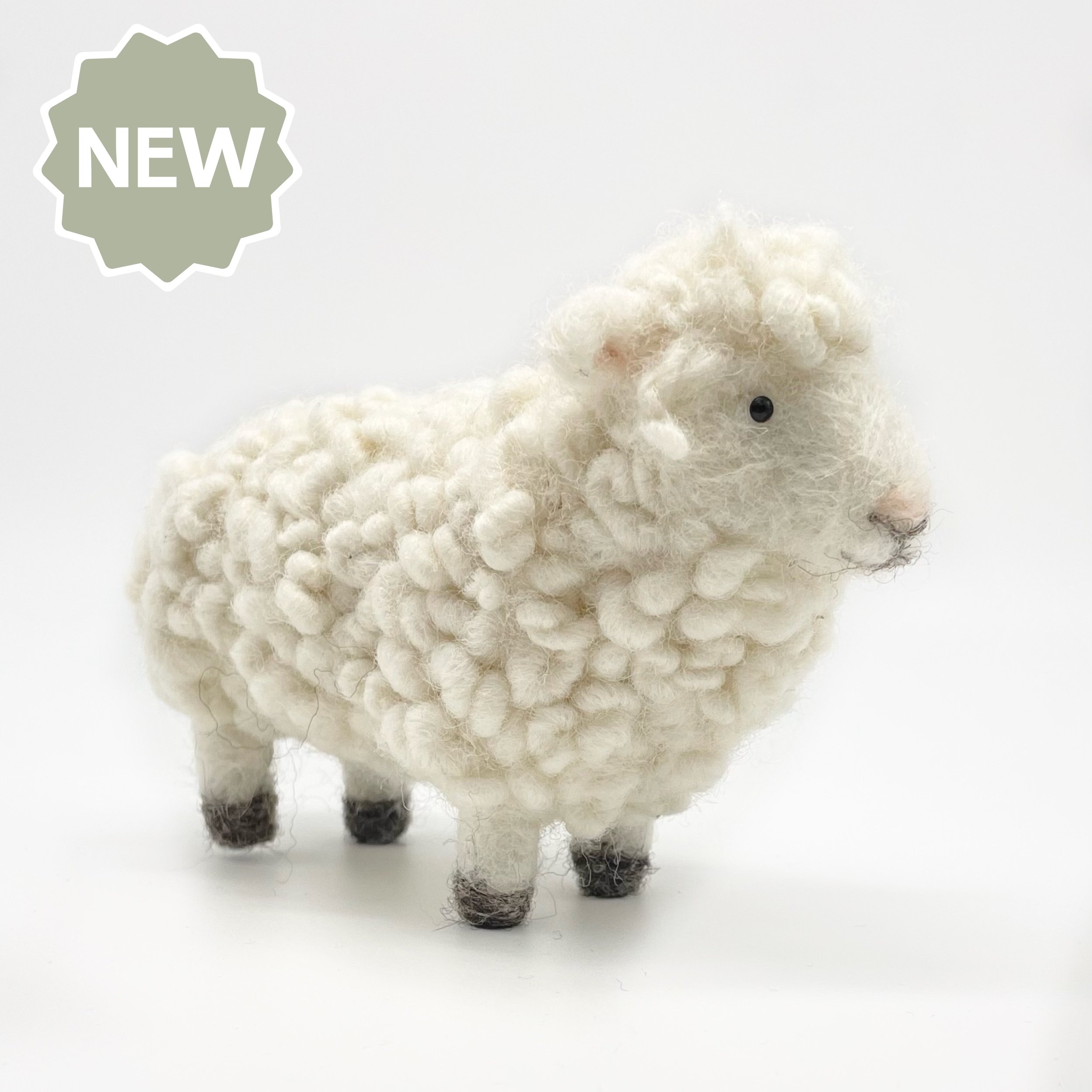Needle felted sheep sculpture
