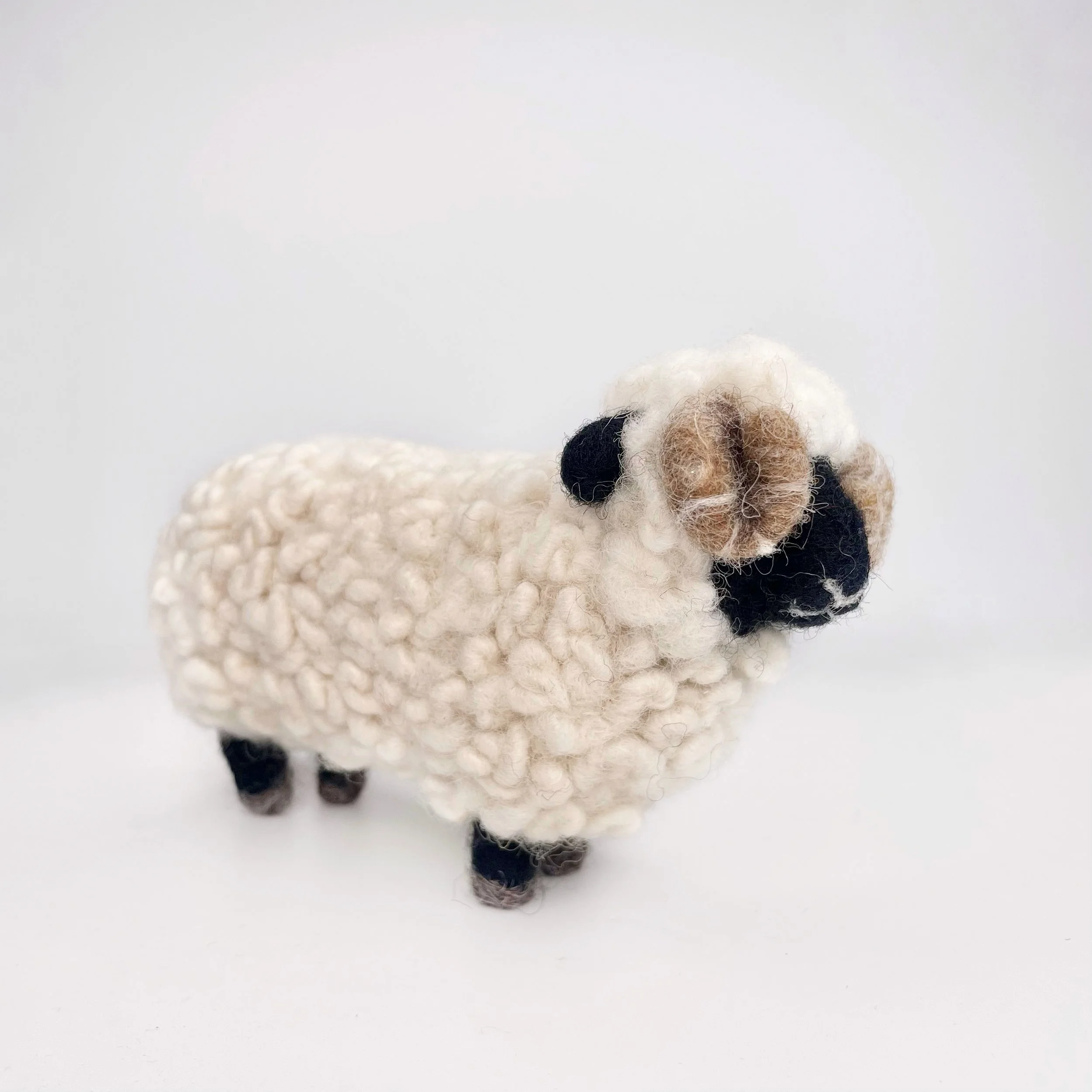 Needle felted wool ram sculpture