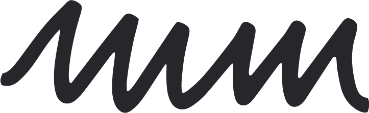 Close-up of a black handwritten-style text that says 'Mmm'.