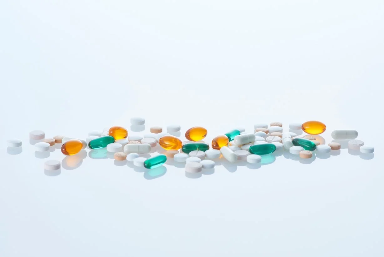 Mix of pills and capsules used in daily medication adherence