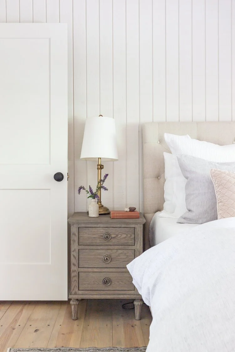 This custom attic renovation in East Aurora, NY transformed an underutilized upper level into a warm, functional, and thoughtfully designed bedroom retreat complete with a private en suite bathroom.