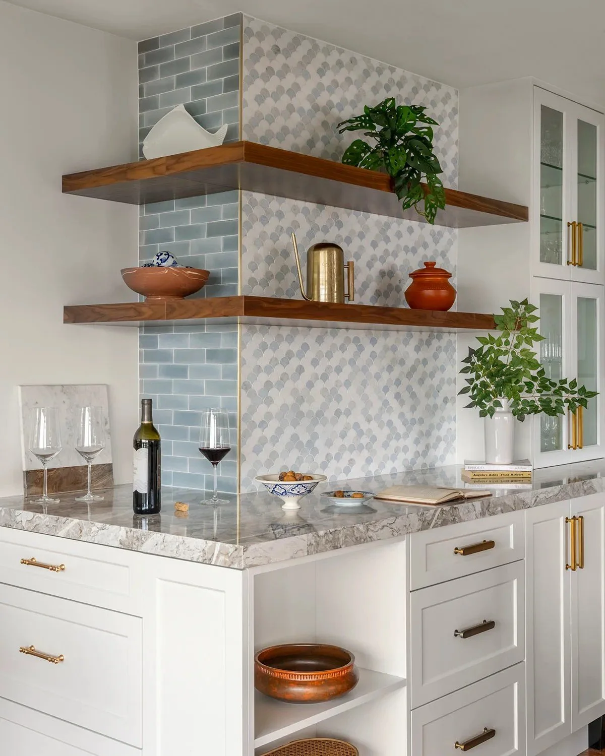  The handmade quality of the tile prevents the room from feeling too polished or flat, giving the kitchen a more relaxed and collected character.
