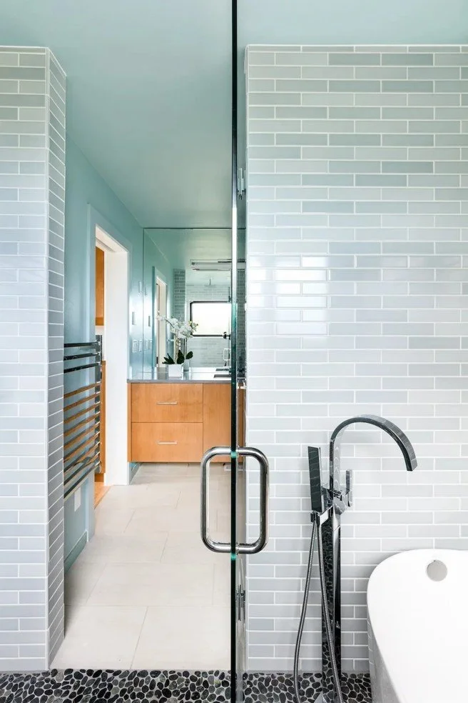 Explore a full-home interior design project in Canandaigua, NY, created as a colorful and collected lakeside forever home for a couple entering their empty-nest years.