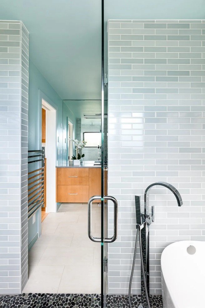 Explore a full-home interior design project in Canandaigua, NY, created as a colorful and collected lakeside forever home for a couple entering their empty-nest years.