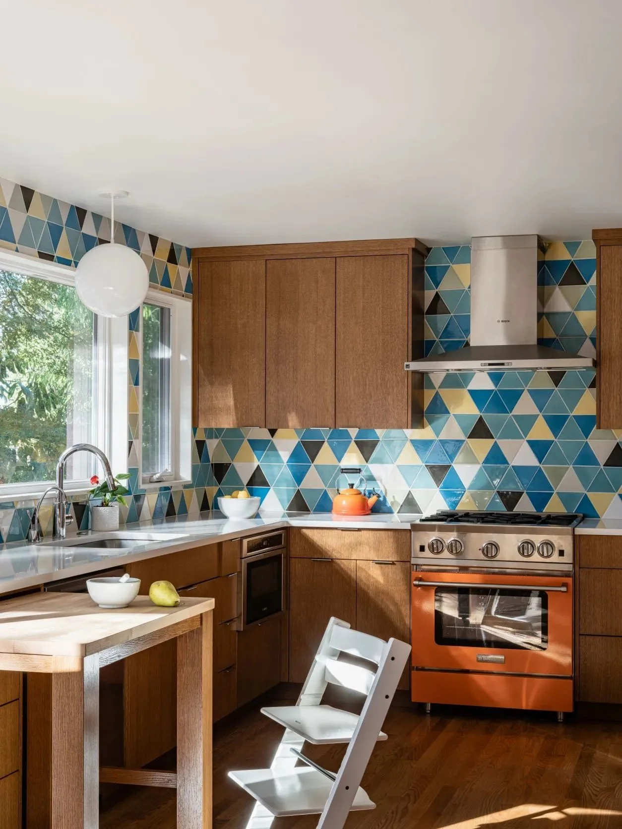 A colorful Snyder home designed for a fresh chapter, blending Craftsman-inspired warmth, natural wood, expressive tile, music, pop art, and collected furnishings into a space that feels joyful and entirely personal.