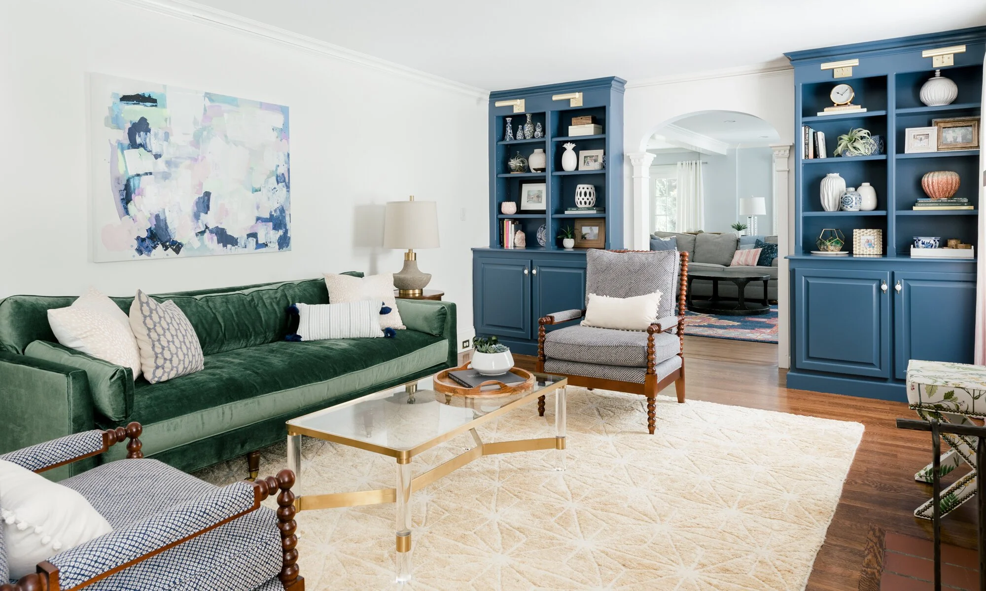 Interior Design & Furniture Selection | Buffalo, NY When designing this Buffalo, NY living room the owners  entrusted our team with a complete redesign, we saw an opportunity to reimagine their beloved space while honoring its history.