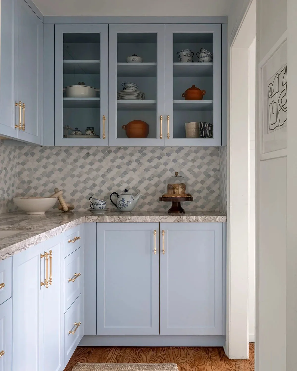 The cabinetry was designed specifically for the home and planned around both function and visual balance