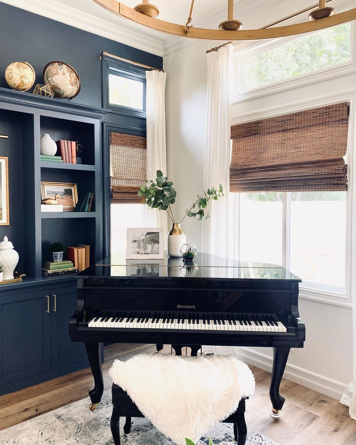 Designed to complement the original architecture of this historic Buffalo home, these custom built-ins and millwork details were fabricated entirely in-house and integrated seamlessly into the surrounding interior design. 