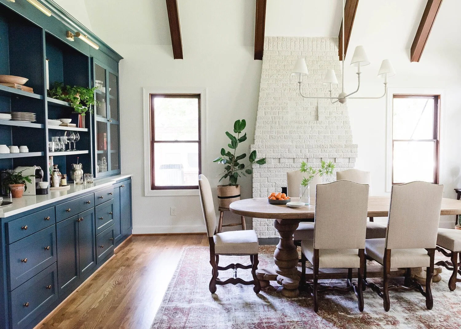 This historic Buffalo kitchen renovation focused on improving flow, increasing storage, and preserving the original architectural warmth of the home.