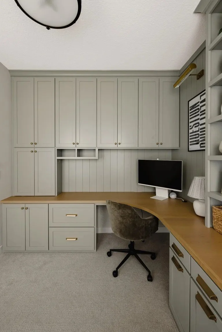 Orchard Park, NY - Interior design & Custom Cabinetry - Office Remodel: If you’ve ever worked from home, you want an office remodel like! With two workstations, decorative open shelving, thoughtful organization, and intentional design, this office ha