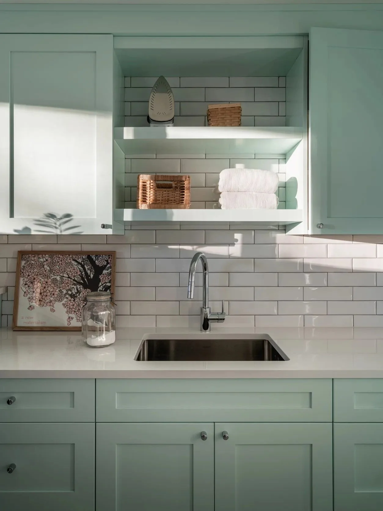 A colorful Snyder home designed for a fresh chapter, blending Craftsman-inspired warmth, natural wood, expressive tile, music, pop art, and collected furnishings into a space that feels joyful and entirely personal.